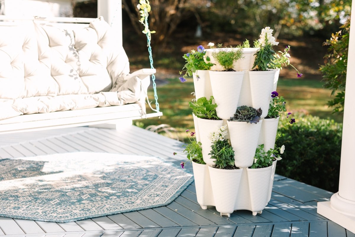 3-Tier GreenStalk Original Vertical Planter with Basket Weave Texture in Stunning Snow on sunny porch