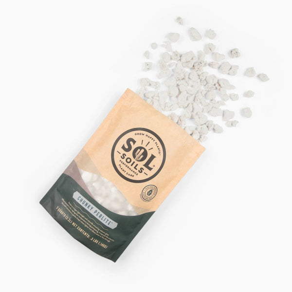 Bag of Sol Soils perlite with perlite spilling out on a white background