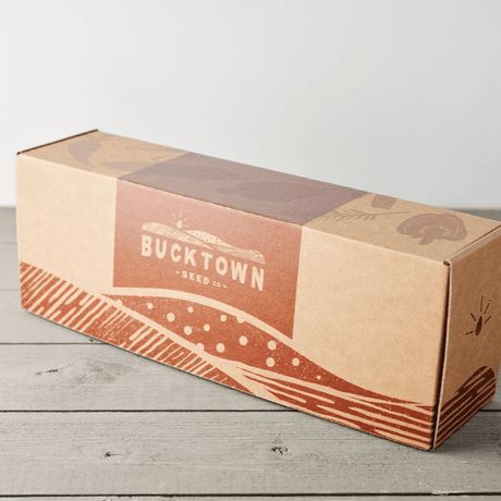 Cardboard box with 'Bucktown Seed Co.' branding on a wooden surface Emergency Seed Bank - Large - Organic Heirloom