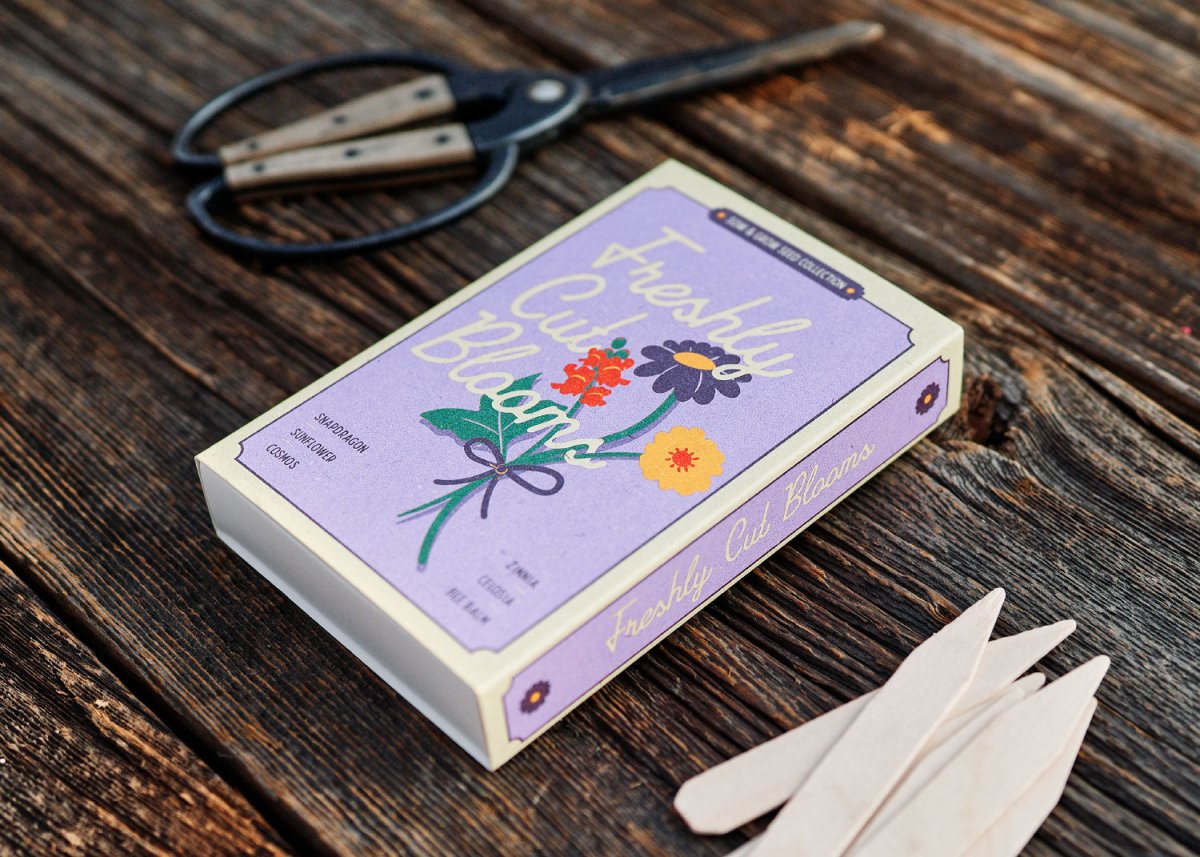 Flower arrangement kit with scissors on a wooden surface